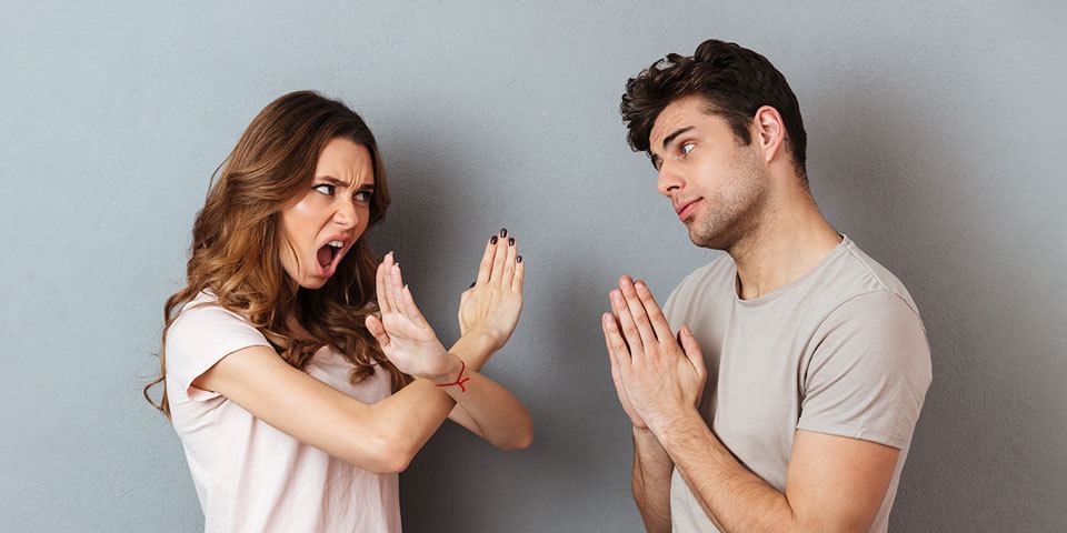 defensive-woman and man