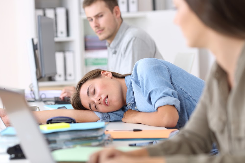 girl sleeping at work