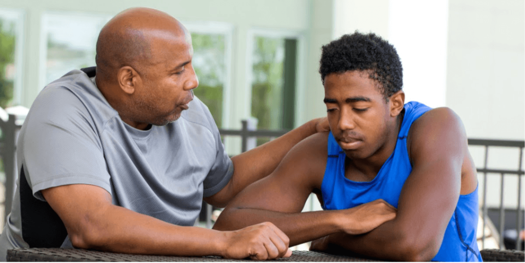 father and son talking